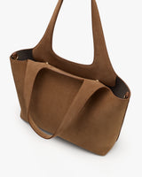 Tote bag with two handles on a plain background.