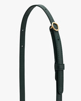 Thin adjustable strap with a buckle and multiple holes.
