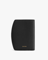 Leather passport holder standing upright