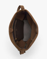 Open travel bag with interior pocket and zipper.
