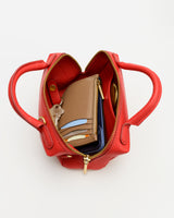 Open handbag with wallet and keys inside