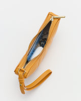 Rectangular wristlet with zippered top open, revealing sunglasses inside.