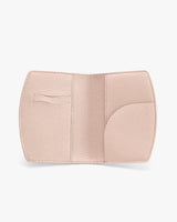 Open textured wallet with card slots and a larger compartment.