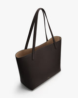 Tote bag with long handles and open top.