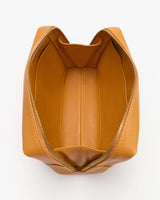 Open travel bag with a zipper viewed from above.