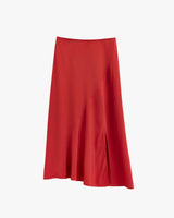 Long skirt with an asymmetrical hem and a side slit.