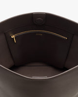 Open handbag with interior zip pocket shown.