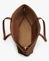 Open tote bag with interior compartments and handles.