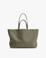 Large tote bag with two handles on a plain background.