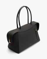 Tote bag with zipper closure and long handles.