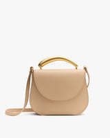 Handbag with a curved top handle and a shoulder strap.