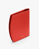 Rectangular textured wallet standing upright.