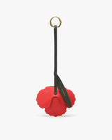 Flower-shaped keychain with a loop and small tag.