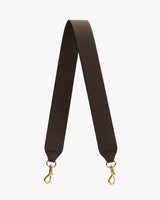 Bag strap with gold clips on both ends.