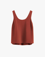 Sleeveless top with round neckline.