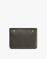 Rectangular leather clutch with metal button accents.