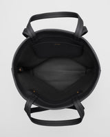 Open tote bag with handles, viewed from above.