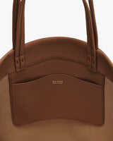 Tote bag with external pocket and double handles.