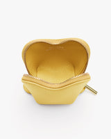 Small open pouch with visible zipper and brand name inside.