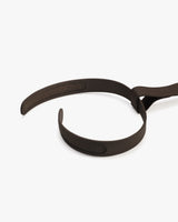 Two connected loops with Velcro closures.