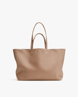 Tote bag with long handles displayed on a plain background.