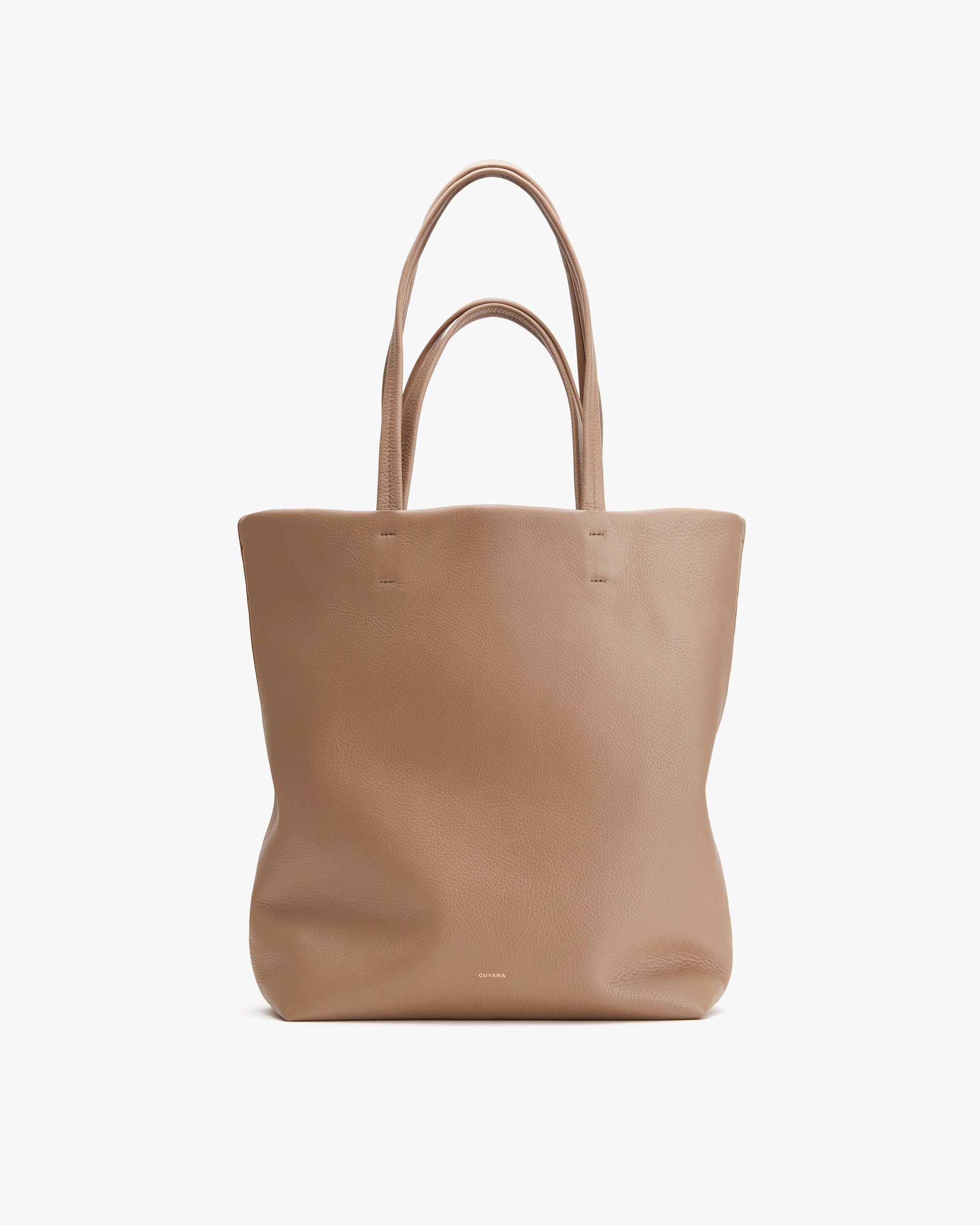 Cuyana tall luxury leather tote for professional commuting