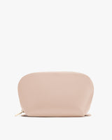Rounded zippered pouch on plain background