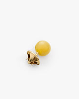 Single stud earring with round bead and spike detail.