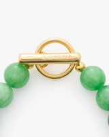 Beaded bracelet with a round clasp connector.