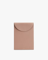 Rectangular envelope clutch with curved flap.