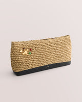 Rectangular woven clutch with decorative pins and a plain base.