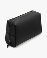 Rectangular toiletry bag with a zipper on the top.
