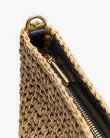 Woven bag with zipper and metal ring detail on the corner.