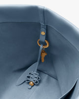 Inside view of a travel bag with a key attached to a strap.