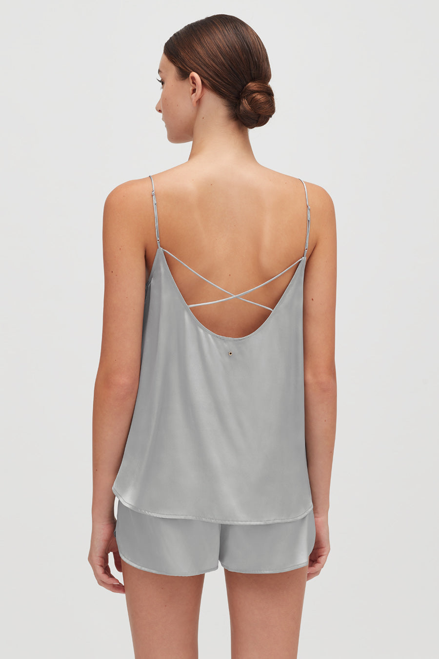 Washable Charmeuse Shorts Woman wearing a tank top with crisscross straps on the back standing.