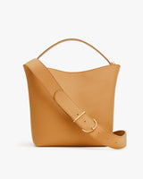 Handbag with top handle and adjustable shoulder strap