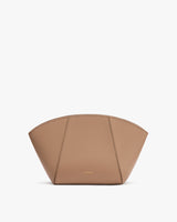 Semi-circular structured pouch with textured surface.