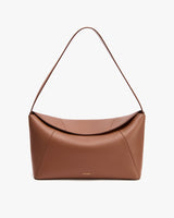 Rectangular handbag with flap and single strap.