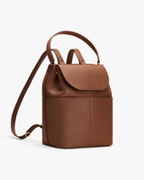 Backpack with a top handle and front flap pocket.