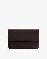 Rectangular textured leather clutch bag with flap closure