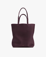 Tote bag with two handles on a plain background