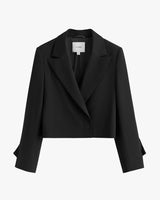 Cropped jacket with a button front and notched lapels.