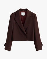 Cropped blazer with a single button closure and notched lapels.