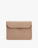 Simple flap closure bag on a plain background