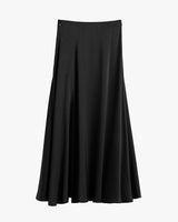 Long flared skirt hanging against a plain background.