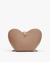 Heart-shaped purse with a clasp closure and flat base.