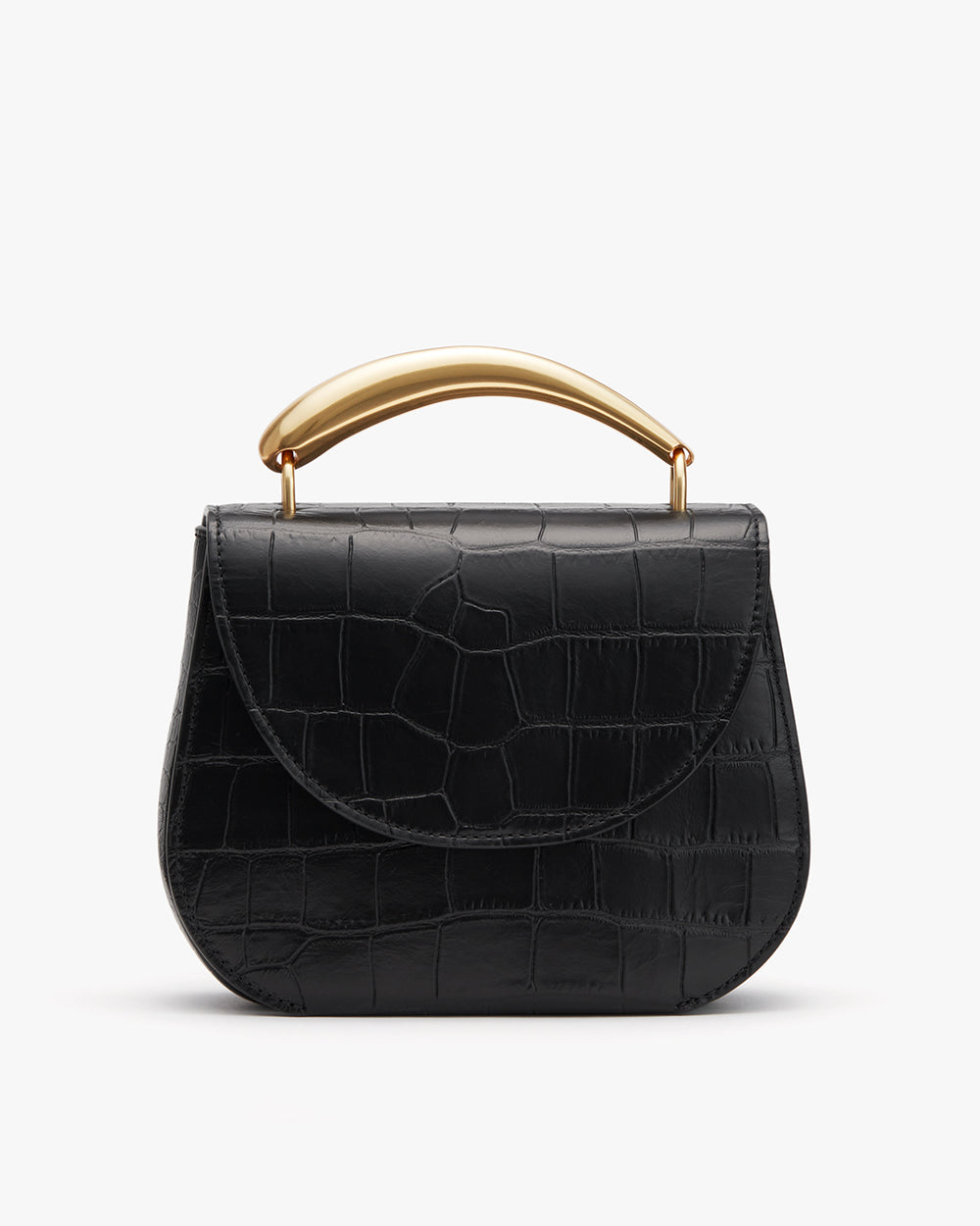 Handbag with a top handle and textured surface.