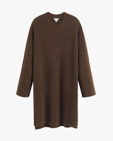 Long-sleeve knitted sweater dress on a hanger.