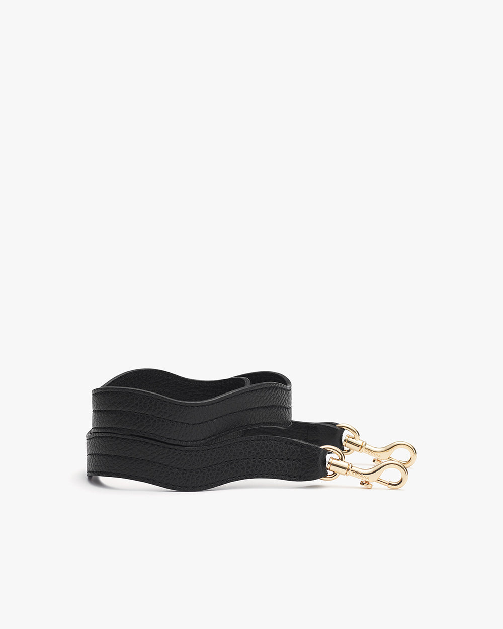 Coiled strap with metal clasps at each end