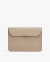A laptop bag with a flap closure